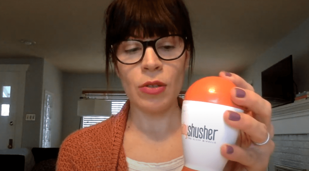 Parent holding a Baby Shusher