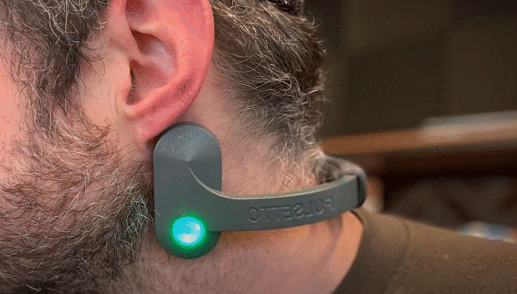man wearing the pulsetto hands-free VNS device
