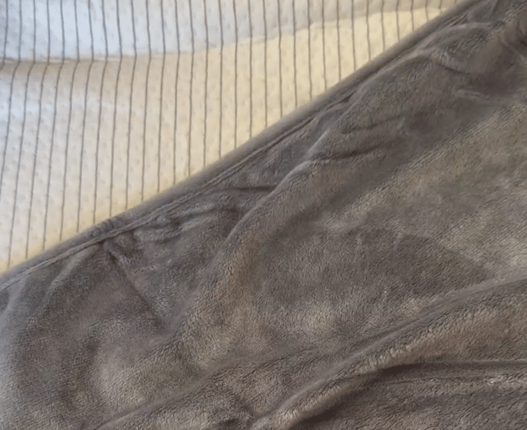 interior of folded hooga grounding blanket and polyester exterior 